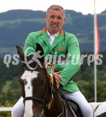 Reiten. Oesterreichische Staatsmeisterschaft. Gerfried Puck auf Equitron Ornaat V. St. Margarethen im Lavanttal. Reiterhof Stueckler, am 24.6.2023.
Foto: Kuess
---
pressefotos, pressefotografie, kuess, qs, qspictures, sport, bild, bilder, bilddatenbank