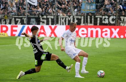 Fussball OEFB Cup. SAK gegen Sturm Graz.  Luka Gajic,  (SAK),   Jusuf Gazibegovic  (Sturm Graz). KLagenfurt, am 22.7.2023.
Foto: Kuess






---
pressefotos, pressefotografie, kuess, qs, qspictures, sport, bild, bilder, bilddatenbank