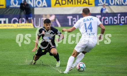 Fussball OEFB Cup. SAK gegen Sturm Graz. Luka Gajic,  (SAK),  Jusuf Gazibegovic   (Sturm Graz). KLagenfurt, am 22.7.2023.
Foto: Kuess






---
pressefotos, pressefotografie, kuess, qs, qspictures, sport, bild, bilder, bilddatenbank