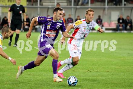 Fussball Bundesliga. SK Austria Klagenfurt gegen WAC.  Andrew Irving, (Klagenfurt),  Mario Leitgeb    (WAC).  Klagenfurt, am 9.8.2023.
Foto: Kuess
---
pressefotos, pressefotografie, kuess, qs, qspictures, sport, bild, bilder, bilddatenbank