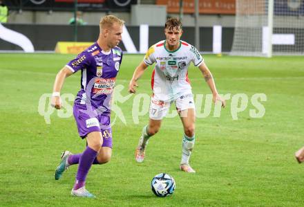 Fussball Bundesliga. SK Austria Klagenfurt gegen WAC.   Florian Jaritz,   (Klagenfurt),  Nikolas Konrad Veratschnig  (WAC).  Klagenfurt, am 9.8.2023.
Foto: Kuess
---
pressefotos, pressefotografie, kuess, qs, qspictures, sport, bild, bilder, bilddatenbank