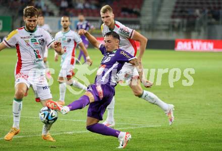 Fussball Bundesliga. SK Austria Klagenfurt gegen WAC.   Sinan Karweina,  (Klagenfurt),    Dominik Baumgartner (WAC).  Klagenfurt, am 9.8.2023.
Foto: Kuess
---
pressefotos, pressefotografie, kuess, qs, qspictures, sport, bild, bilder, bilddatenbank