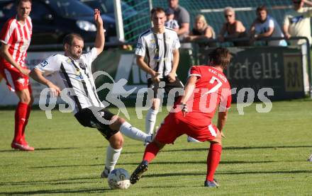 Fussball Kaerntner Liga. Bleiburg gegen KAC.  Patrick Paul Oswaldi  (Bleiburg),   Jakob Orgonyi  (KAC). Bleiburg, am 12.8.2023.
Foto: Kuess
---
pressefotos, pressefotografie, kuess, qs, qspictures, sport, bild, bilder, bilddatenbank