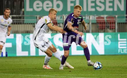 Fussball Bundesliga. SK Austria Klagenfurt gegen Cashpoint SCR Altach.  Jonas Arweiler,  (Klagenfurt),   Lukas Josef Gugganig  (Altach).  Klagenfurt, am 19.8.2023.
Foto: Kuess
---
pressefotos, pressefotografie, kuess, qs, qspictures, sport, bild, bilder, bilddatenbank