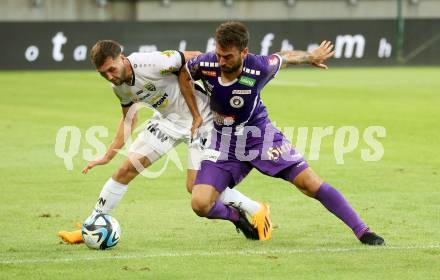 Fussball Bundesliga. SK Austria Klagenfurt gegen Cashpoint SCR Altach.  Kosmas Gkezos,   (Klagenfurt),  Lukas Fadinger  (Altach).  Klagenfurt, am 19.8.2023.
Foto: Kuess
---
pressefotos, pressefotografie, kuess, qs, qspictures, sport, bild, bilder, bilddatenbank