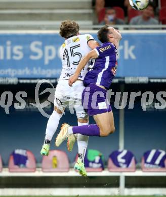 Fussball Bundesliga. SK Austria Klagenfurt gegen Cashpoint SCR Altach.   Andrew Irving,   (Klagenfurt),  Paul-Friedrich Koller  (Altach).  Klagenfurt, am 19.8.2023.
Foto: Kuess
---
pressefotos, pressefotografie, kuess, qs, qspictures, sport, bild, bilder, bilddatenbank