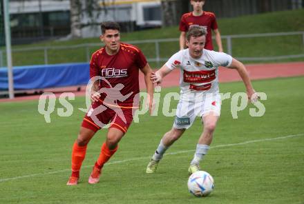 Fussball Unterliga West. Lienz gegen Woelfnitz   Benjamin Josef Michael Martin Buergler (Lienz),   Aljaz Tot  (Woelfnitz). Lienz am 26.8.2023.
Foto: Kuess
---
pressefotos, pressefotografie, kuess, qs, qspictures, sport, bild, bilder, bilddatenbank