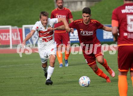 Fussball Unterliga West. Lienz gegen Woelfnitz  Dominic Josef Girstmair  (Lienz),     Aljaz Tot (Woelfnitz). Lienz am 26.8.2023.
Foto: Kuess
---
pressefotos, pressefotografie, kuess, qs, qspictures, sport, bild, bilder, bilddatenbank