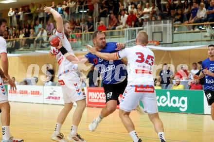 Handball BUndesliga. SC Ferlach gegen HC FIVERS WAT Margareten. Patrik Leban,  (SCF),    Florian Heizinger, Lukas Gangel  (Margareten). Ferlach, am 5.9.2023.
Foto: Kuess
---
pressefotos, pressefotografie, kuess, qs, qspictures, sport, bild, bilder, bilddatenbank