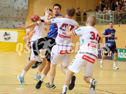 Handball BUndesliga. SC Ferlach gegen HC FIVERS WAT Margareten.  Mladan Jovanovic, (SCF),   Jakob Nigg, Lukas Gangel  (Margareten). Ferlach, am 5.9.2023.
Foto: Kuess
---
pressefotos, pressefotografie, kuess, qs, qspictures, sport, bild, bilder, bilddatenbank