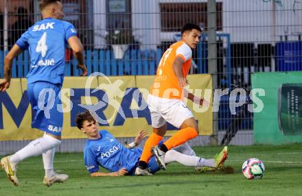 Fussball Kaerntner Liga. SAK gegen Donau.   Jan Sasa Ogris-Martic  (SAK),  Damjan Jovanovic  (Donau). Klagenfurt, am 15.9.2023.
Foto: Kuess
---
pressefotos, pressefotografie, kuess, qs, qspictures, sport, bild, bilder, bilddatenbank