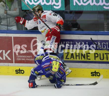 EBEL. Eishockey Bundesliga. EC VSV gegen HCB Suedtirol Alperia.   Arturs Kulda,    (VSV),    Dylan Di Perna (Bozen). Villach, am 19.9.2023
Foto: Kuess
www.qspictures.net
---
pressefotos, pressefotografie, kuess, qs, qspictures, sport, bild, bilder, bilddatenbank