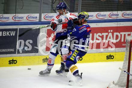 EBEL. Eishockey Bundesliga. EC VSV gegen HC Innsbruck Die Haie.   Arturs Kulda,   (VSV),   Dario Winkler (Innsbruck). Villach, am 22.9.2023
Foto: Kuess
www.qspictures.net
---
pressefotos, pressefotografie, kuess, qs, qspictures, sport, bild, bilder, bilddatenbank