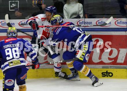 EBEL. Eishockey Bundesliga. EC VSV gegen HC Innsbruck Die Haie.   Arturs Kulda, (VSV),   Lukas Baer   (Innsbruck). Villach, am 22.9.2023
Foto: Kuess
www.qspictures.net
---
pressefotos, pressefotografie, kuess, qs, qspictures, sport, bild, bilder, bilddatenbank