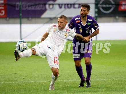 Fussball Bundesliga. SK Austria Klagenfurt gegen SC Austria Lustenau.  Kosmas Gkezos,   (Klagenfurt),    ANTHONY SCHMID (Lustenau).  Klagenfurt, am 23.9.2023.
Foto: Kuess
---
pressefotos, pressefotografie, kuess, qs, qspictures, sport, bild, bilder, bilddatenbank