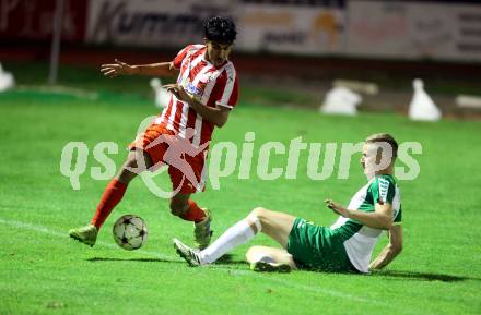 Fussball. Kaerntner Liga. Voelkermarkt gegen KAC.  Daniel Ulrich Primusch  (Voelkermarkt),    Amir Mohammadi (KAC). Voelkermarkt, 29.9.2023.
Foto: Kuess
www.qspictures.net
---
pressefotos, pressefotografie, kuess, qs, qspictures, sport, bild, bilder, bilddatenbank