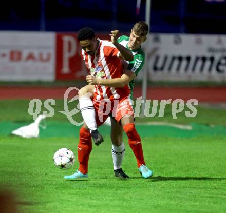 Fussball. Kaerntner Liga. Voelkermarkt gegen KAC. Lukas Anton Olschnig  (Voelkermarkt),    Sandro Jose Da Silva (KAC). Voelkermarkt, 29.9.2023.
Foto: Kuess
www.qspictures.net
---
pressefotos, pressefotografie, kuess, qs, qspictures, sport, bild, bilder, bilddatenbank