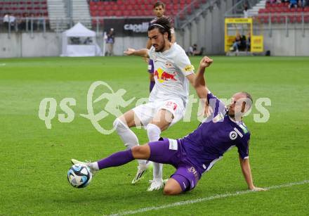 Fussball Bundesliga. SK Austria Klagenfurt gegen FC Red Bull Salzburg.  Rico Benatelli,   (Klagenfurt),  Roko Simic  (Salzburg).  Klagenfurt, am 8.10.2023.
Foto: Kuess
---
pressefotos, pressefotografie, kuess, qs, qspictures, sport, bild, bilder, bilddatenbank