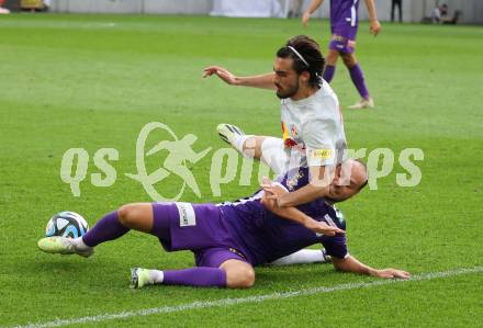 Fussball Bundesliga. SK Austria Klagenfurt gegen FC Red Bull Salzburg. Rico Benatelli,    (Klagenfurt),  Roko Simic  (Salzburg).  Klagenfurt, am 8.10.2023.
Foto: Kuess
---
pressefotos, pressefotografie, kuess, qs, qspictures, sport, bild, bilder, bilddatenbank