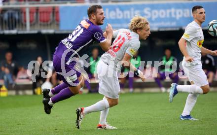 Fussball Bundesliga. SK Austria Klagenfurt gegen FC Red Bull Salzburg.  Turgay Gemicibasi,  (Klagenfurt), Mads Bidstrup    (Salzburg).  Klagenfurt, am 8.10.2023.
Foto: Kuess
---
pressefotos, pressefotografie, kuess, qs, qspictures, sport, bild, bilder, bilddatenbank