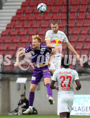 Fussball Bundesliga. SK Austria Klagenfurt gegen FC Red Bull Salzburg.  Jonas Arweiler,   (Klagenfurt),  Strahinja Pavlovic  (Salzburg).  Klagenfurt, am 8.10.2023.
Foto: Kuess
---
pressefotos, pressefotografie, kuess, qs, qspictures, sport, bild, bilder, bilddatenbank