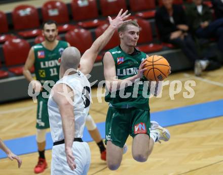 Basketball 2. Liga 2023/2024. Grunddurchgang 2. Runde.  KOS Celovec gegen Dornbirn Lions.  Anton Marusic (KOS), Markuss Kudrjavcevs  (Dornbirn). Klagenfurt, am 14.10.2023.
Foto: Kuess
www.qspictures.net
---
pressefotos, pressefotografie, kuess, qs, qspictures, sport, bild, bilder, bilddatenbank