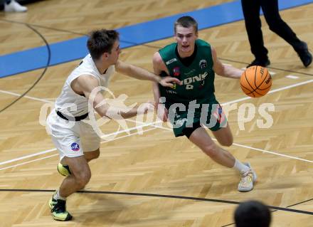 Basketball 2. Liga 2023/2024. Grunddurchgang 2. Runde.  KOS Celovec gegen Dornbirn Lions.  Niklas Michel (KOS),  Markuss Kudrjavcevs (Dornbirn). Klagenfurt, am 14.10.2023.
Foto: Kuess
www.qspictures.net
---
pressefotos, pressefotografie, kuess, qs, qspictures, sport, bild, bilder, bilddatenbank