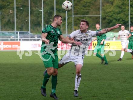 Fussball. Kaerntner Liga. Landskron gegen Koettmannsdorf.  Martin Posratschnig  (Landskron),    Ziga Erzen (Koettmannsdorf).  Landskron, 21.10.2023.
Foto: Kuess
www.qspictures.net
---
pressefotos, pressefotografie, kuess, qs, qspictures, sport, bild, bilder, bilddatenbank