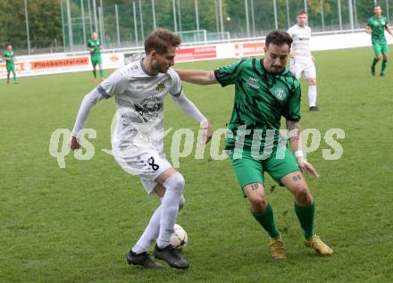 Fussball. Kaerntner Liga. Landskron gegen Koettmannsdorf.  Nemanja Lukic  (Landskron),  Daniel Perkounig  (Koettmannsdorf).  Landskron, 21.10.2023.
Foto: Kuess
www.qspictures.net
---
pressefotos, pressefotografie, kuess, qs, qspictures, sport, bild, bilder, bilddatenbank