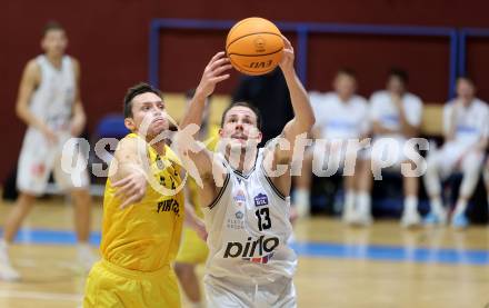 Basketball 2. Liga 2023/2024. Grunddurchgang 3. Runde.  Woerthersee Piraten gegen Kufstein Towers. Jan-Arne Apschner,  (Piraten),   Fabio Thaler (Kufstein). Klagenfurt, am 21.10.2023.
Foto: Kuess
www.qspictures.net
---
pressefotos, pressefotografie, kuess, qs, qspictures, sport, bild, bilder, bilddatenbank