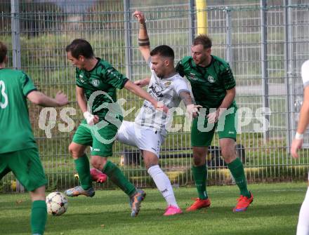 Fussball. Kaerntner Liga. Landskron gegen Koettmannsdorf. Philipp Gatti   (Landskron),   Adis Ajkic (Koettmannsdorf).  Landskron, 21.10.2023.
Foto: Kuess
www.qspictures.net
---
pressefotos, pressefotografie, kuess, qs, qspictures, sport, bild, bilder, bilddatenbank