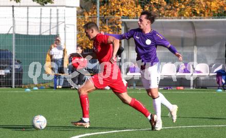 Fussball Kaerntner Liga. SK Austria Klagenfurt gegen SAK. Nico Daniel Taschwer (Austria Klagenfurt),  Luka Gajic (SAK). Klagenfurt, am 28.10.2023.
Foto: Kuess
---
pressefotos, pressefotografie, kuess, qs, qspictures, sport, bild, bilder, bilddatenbank