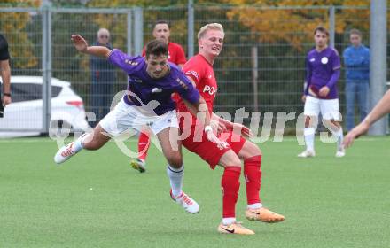 Fussball Kaerntner Liga. SK Austria Klagenfurt gegen SAK. Nemanja Pavicevic (Austria Klagenfurt), Toni Dullnig (SAK). Klagenfurt, am 28.10.2023.
Foto: Kuess
---
pressefotos, pressefotografie, kuess, qs, qspictures, sport, bild, bilder, bilddatenbank