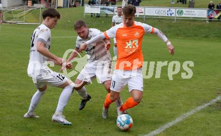 Fussball. Kaerntner Liga. Koettmannsdorf gegen Donau.  Marcel Daniel Arrich, Ziga Erzen (Koettmanndorf),   Maximilian Gert Rupitsch (Donau). Koettmannsdorf, 29.10.2023.
Foto: Kuess
www.qspictures.net
---
pressefotos, pressefotografie, kuess, qs, qspictures, sport, bild, bilder, bilddatenbank