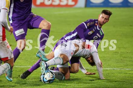 Fussball Bundesliga. WAC gegen SK Austria Klagenfurt.  Bernhard Zimmermann  (WAC),  Till Schumacher (Klagenfurt).  Wolfsberg, am 4.11.2023.
Foto: Kuess
www.qspictures.net
---
pressefotos, pressefotografie, kuess, qs, qspictures, sport, bild, bilder, bilddatenbank