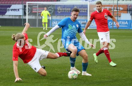 Fussball Laenderspiel Amateure. Oesterreich gegen Slowenien.  Felix Schoech, (AUT),  Nejc Doplihar  (SLO). Klagenfurt, am 26.11.2023.
Foto: Kuess
www.qspictures.net
---
pressefotos, pressefotografie, kuess, qs, qspictures, sport, bild, bilder, bilddatenbank