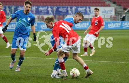 Fussball Laenderspiel Amateure. Oesterreich gegen Slowenien.  Michael Morgenstern,  (AUT),   Andraz Lipec (SLO). Klagenfurt, am 26.11.2023.
Foto: Kuess
www.qspictures.net
---
pressefotos, pressefotografie, kuess, qs, qspictures, sport, bild, bilder, bilddatenbank