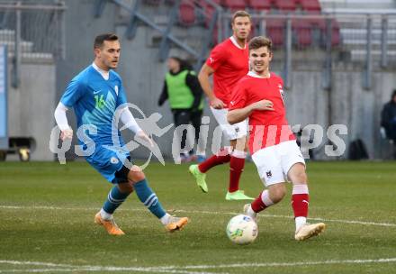 Fussball Laenderspiel Amateure. Oesterreich gegen Slowenien. Jan-Niklas Ostermann,   (AUT),   Ziga Caks (SLO). Klagenfurt, am 26.11.2023.
Foto: Kuess
www.qspictures.net
---
pressefotos, pressefotografie, kuess, qs, qspictures, sport, bild, bilder, bilddatenbank