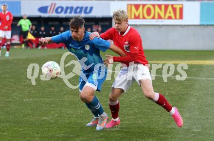 Fussball Laenderspiel Amateure. Oesterreich gegen Slowenien. Daniel Hoelbling,  (AUT),  Franci Perko  (SLO). Klagenfurt, am 26.11.2023.
Foto: Kuess
www.qspictures.net
---
pressefotos, pressefotografie, kuess, qs, qspictures, sport, bild, bilder, bilddatenbank