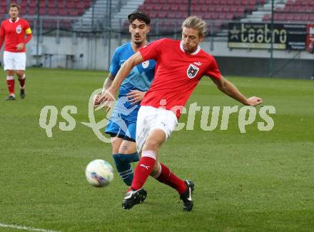 Fussball Laenderspiel Amateure. Oesterreich gegen Slowenien. Felix Schoech, (AUT), Tomi Gobec    (SLO). Klagenfurt, am 26.11.2023.
Foto: Kuess
www.qspictures.net
---
pressefotos, pressefotografie, kuess, qs, qspictures, sport, bild, bilder, bilddatenbank