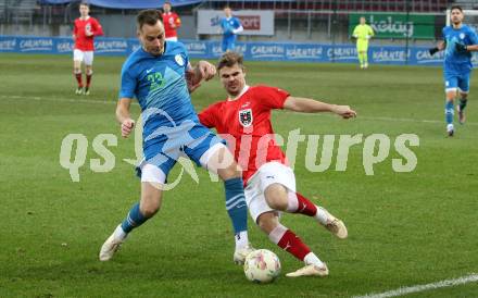 Fussball Laenderspiel Amateure. Oesterreich gegen Slowenien.  Jan-Niklas Ostermann,  (AUT),   Nejc Dopplihar (SLO). Klagenfurt, am 26.11.2023.
Foto: Kuess
www.qspictures.net
---
pressefotos, pressefotografie, kuess, qs, qspictures, sport, bild, bilder, bilddatenbank