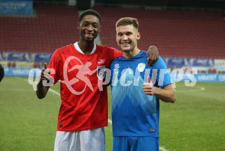 Fussball Laenderspiel Amateure. Oesterreich gegen Slowenien. Mersei Dieu Nsandi,  (AUT),   Anej Kmetic  (SLO). Klagenfurt, am 26.11.2023.
Foto: Kuess
www.qspictures.net
---
pressefotos, pressefotografie, kuess, qs, qspictures, sport, bild, bilder, bilddatenbank