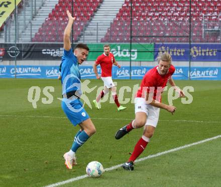 Fussball Laenderspiel Amateure. Oesterreich gegen Slowenien.  Felix Schoech,  (AUT),  Anej Kmetic  (SLO). Klagenfurt, am 26.11.2023.
Foto: Kuess
www.qspictures.net
---
pressefotos, pressefotografie, kuess, qs, qspictures, sport, bild, bilder, bilddatenbank