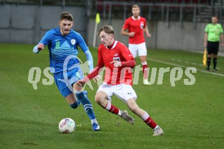 Fussball Laenderspiel Amateure. Oesterreich gegen Slowenien.  Michael Morgenstern,  (AUT),   Al Mahic (SLO). Klagenfurt, am 26.11.2023.
Foto: Kuess
www.qspictures.net
---
pressefotos, pressefotografie, kuess, qs, qspictures, sport, bild, bilder, bilddatenbank