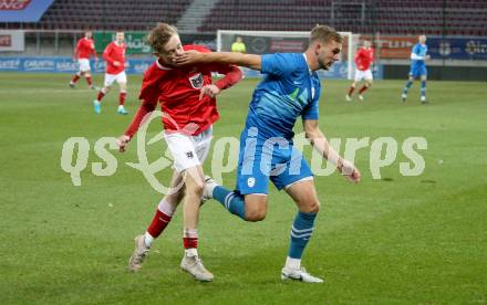 Fussball Laenderspiel Amateure. Oesterreich gegen Slowenien.  Michael Morgenstern,  (AUT),   Andraz Lipec (SLO). Klagenfurt, am 26.11.2023.
Foto: Kuess
www.qspictures.net
---
pressefotos, pressefotografie, kuess, qs, qspictures, sport, bild, bilder, bilddatenbank