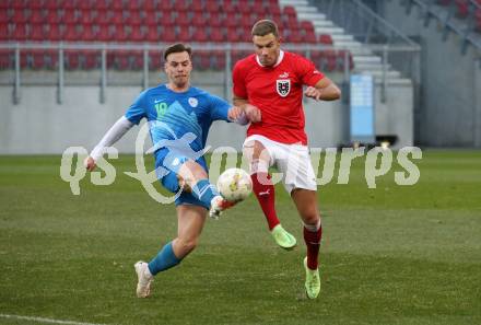 Fussball Laenderspiel Amateure. Oesterreich gegen Slowenien.  Daniel Fischer,  (AUT),  Ziga Ribic (SLO). Klagenfurt, am 26.11.2023.
Foto: Kuess
www.qspictures.net
---
pressefotos, pressefotografie, kuess, qs, qspictures, sport, bild, bilder, bilddatenbank