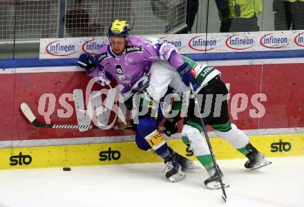 EBEL. Eishockey Bundesliga. EC VSV gegen HK Olimpija Ljubljana.  Blaz Tomazevic,   (VSV),    Maris Bicevskis (Ljubljana). Villach, am 28.11.2023
Foto: Kuess
www.qspictures.net
---
pressefotos, pressefotografie, kuess, qs, qspictures, sport, bild, bilder, bilddatenbank