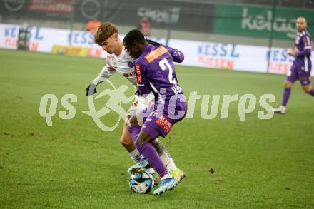 Fussball Bundesliga. SK Austria Klagenfurt gegen FK Austria Wien.   Solomon Bonnah,    (Klagenfurt),   Muharem Huskovic (Wien).  Klagenfurt, am 9.12.2023.
Foto: Kuess
---
pressefotos, pressefotografie, kuess, qs, qspictures, sport, bild, bilder, bilddatenbank