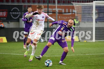 Fussball Bundesliga. SK Austria Klagenfurt gegen FK Austria Wien.  Rico Benatelli,   (Klagenfurt),   Muharem Huskovic  (Wien).  Klagenfurt, am 9.12.2023.
Foto: Kuess
---
pressefotos, pressefotografie, kuess, qs, qspictures, sport, bild, bilder, bilddatenbank