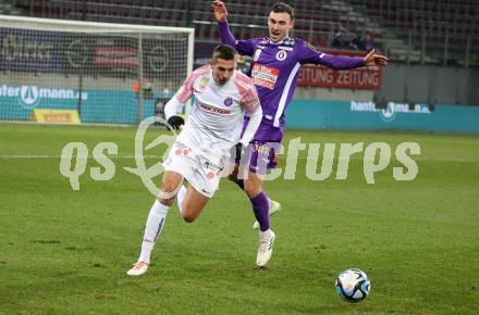 Fussball. Bundesliga. SK Austria Klagenfurt gegen Austria Wien.  Andrew Irving   (Austria Klagenfurt),   Johannes Handl   (Wien). Klagenfurt, 9.12.2023.
Foto: Kuess
---
pressefotos, pressefotografie, kuess, qs, qspictures, sport, bild, bilder, bilddatenbank